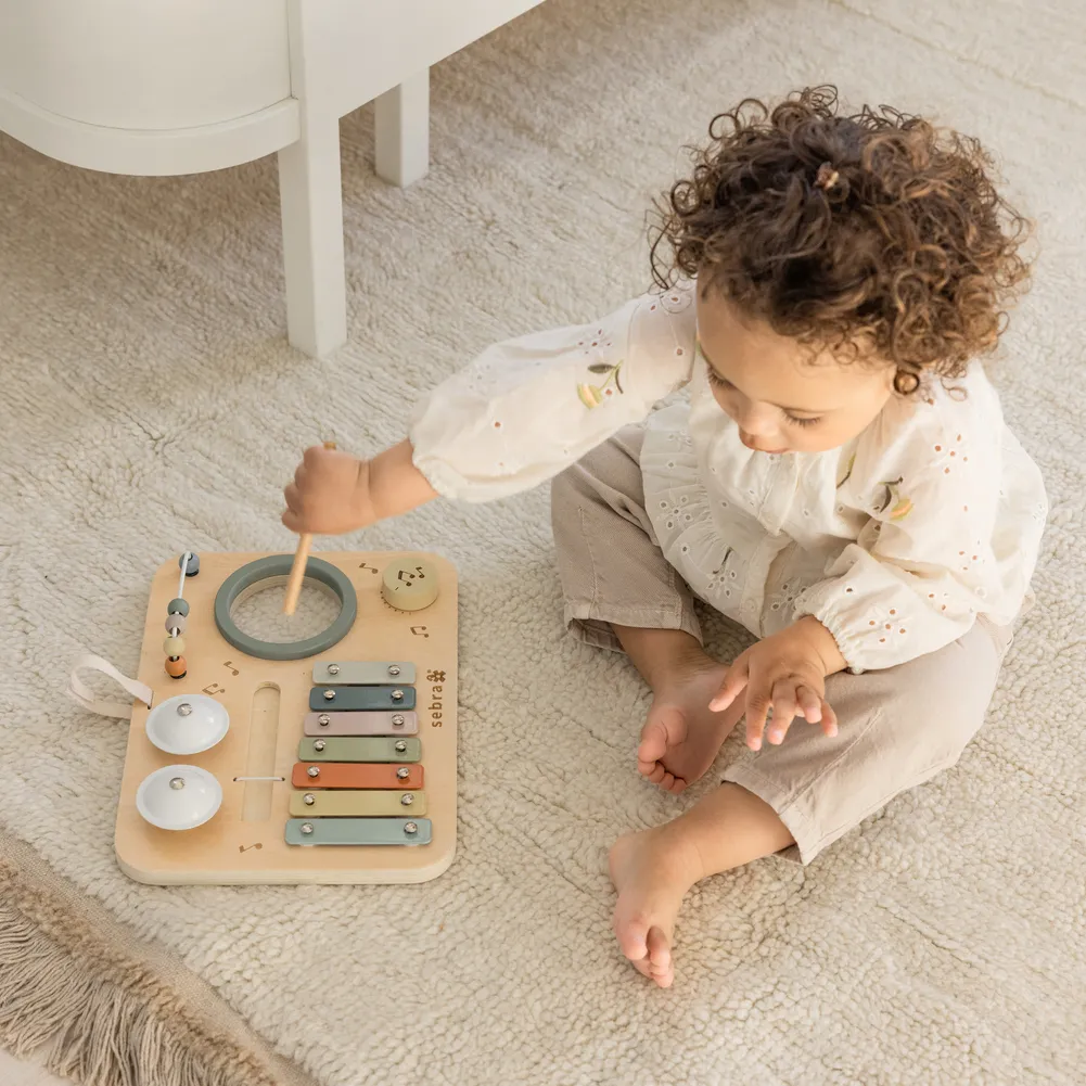 Sebra musik-aktivitetspanel i træ