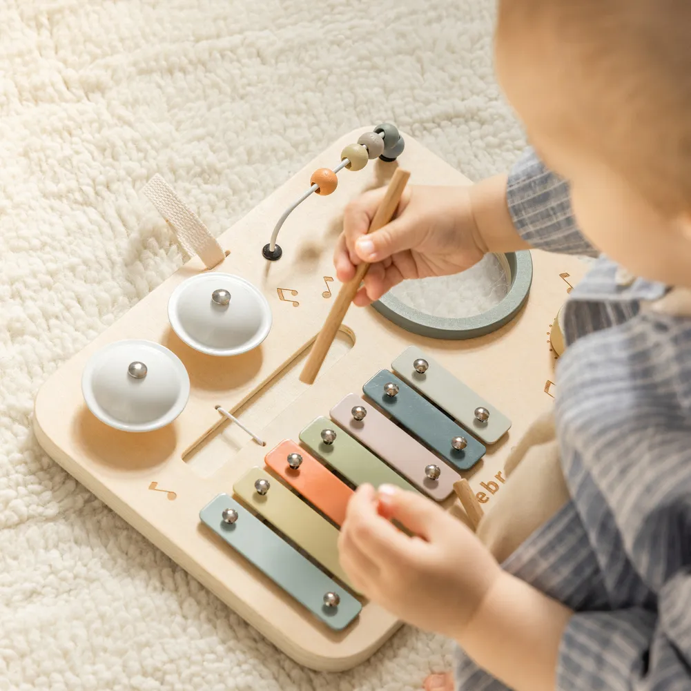 Sebra musik-aktivitetspanel i træ